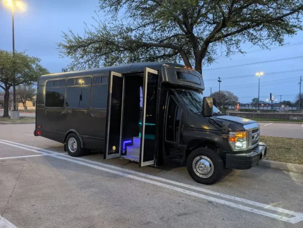 Party Bus - Exterior with doors open and lit entry steps - Dallas VIP Transportation