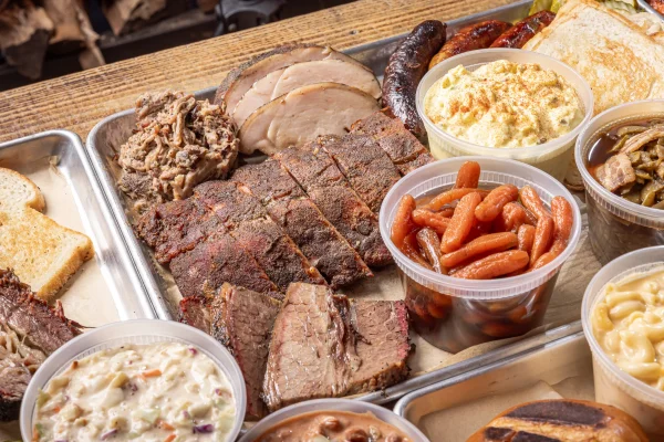 Close view of Strouderosa smoked ribs, brisket, turkey, sausage and homestyle sides