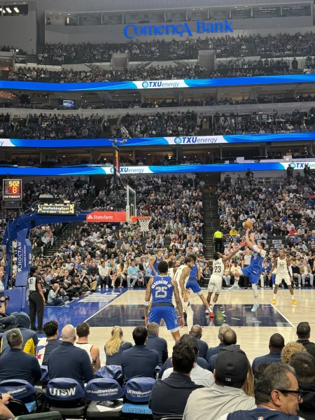 Dallas Mavericks - Mavs forward rising for a jumper in front of a packed lower bowl - Dallas VIP