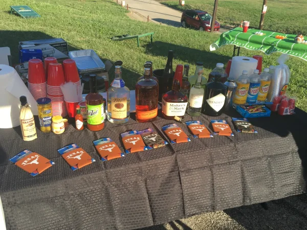 Texas vs OU - Tailgate bar stocked with spirits, Bloody Mary fixings and Longhorns koozies - Dallas VIP